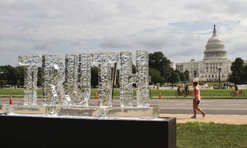 Melting ice sculpture protests ‘fake news’ at US Capitol