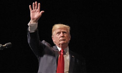 Trump claims victory as court partially reinstates travel ban