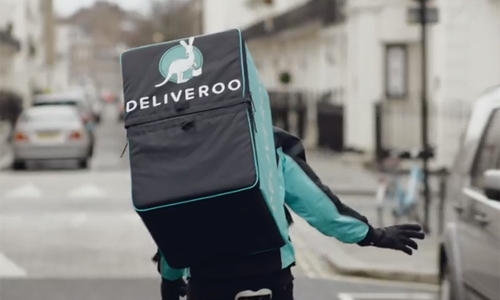 Amazon invests in British food courier Deliveroo
