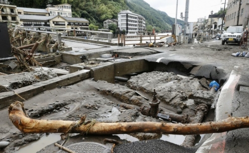 Japan battered by more heavy rain, floods, nearly 60 dead