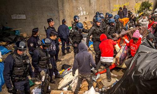 Migrants clash with police as security stepped up at French camps