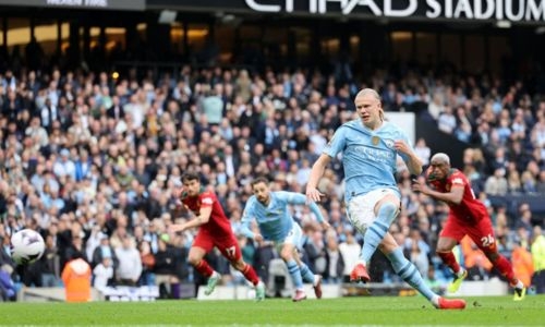 Haaland hits four as Man City keep title pressure on leaders
