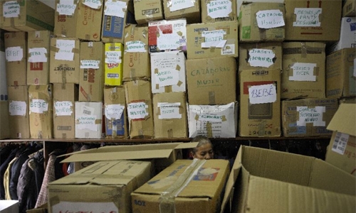 Three dead after piles of clothes falls on them Three dead after piles of clothes falls on them