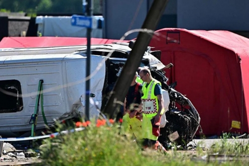 Train hits school bus in Belgium, several victims: minister 