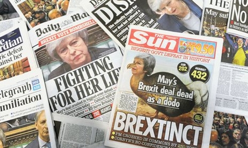 British press says May ‘crushed’ by Brexit defeat