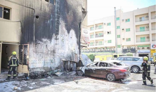 Residents saved from rooftop as flames consume building