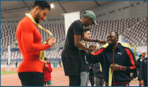 Usain Bolt Surprises Runners at PUMA Shakeout Run in Doha