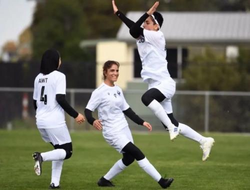 Afghan women footballers celebrate 'historic moment'