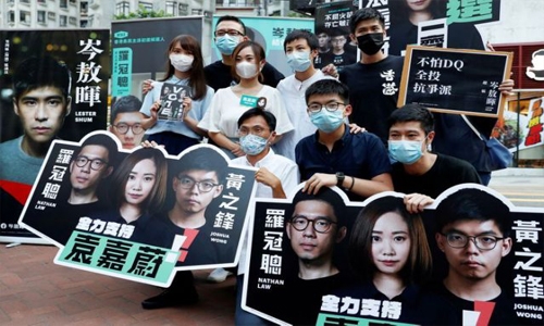  Hong Kong democracy activists arrested under security law as crackdown intensifies