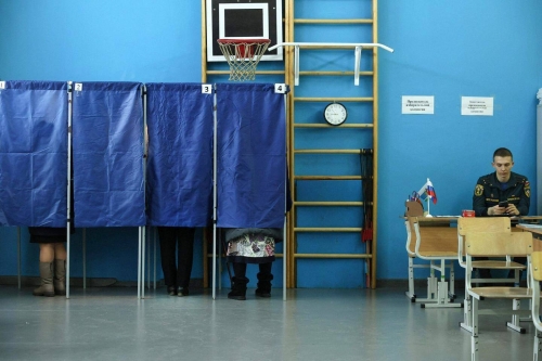 Russian ballot boxes vandalised as presidential election starts