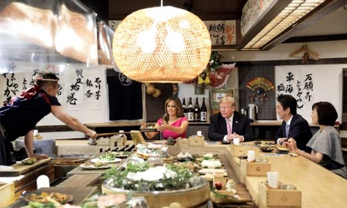 Abe woos ‘golf buddy’ Trump Abe woos ‘golf buddy’ Trump