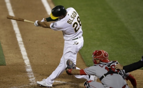In first MLB game with new extra-inning rule, A’s slam Angels