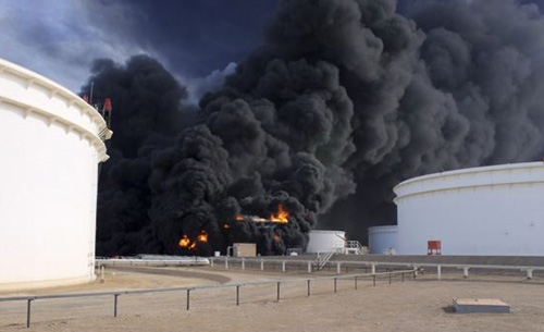 Libya oil storage tanks set fire during IS assault