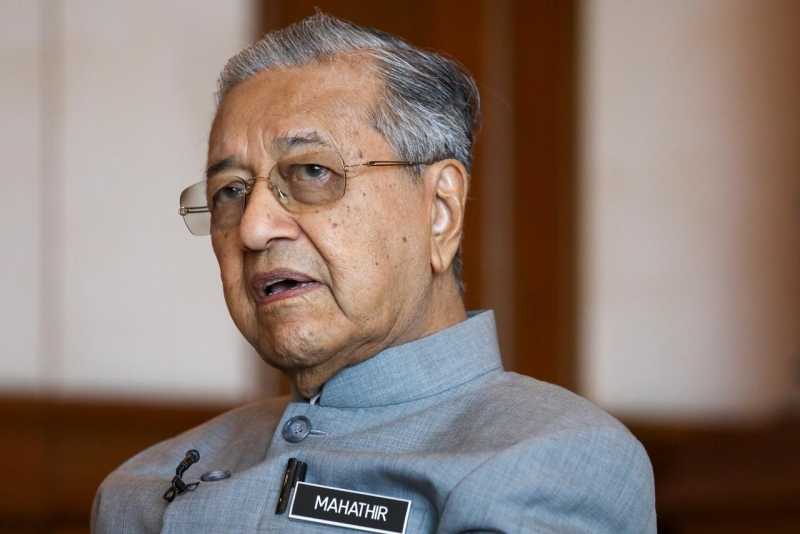 Malaysian PM again hints he could stay on beyond 2020