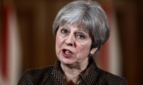 May defends Syria strikes