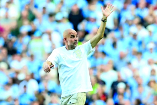 Italian FA chief says in touch with Guardiola over coaching vacancy Italian FA chief says in touch with Guardiola over coaching vacancy