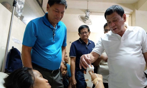 Twin Philippine bombings wound 39 Twin Philippine bombings wound 39