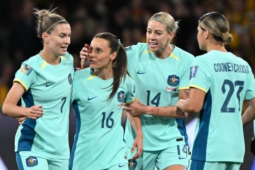 Australia destroy Canada to surge into World Cup last 16 Australia destroy Canada to surge into World Cup last 16