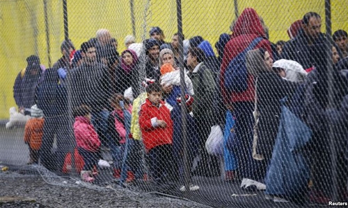 French police arrest 14 at Calais anti-migrant protest