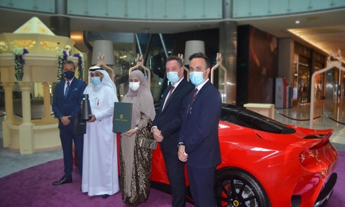 MODA Mall hands over keys to Lotus GT Evora Grand Prize winner