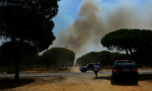 Fire licks Spanish nature reserve, 1,800 evacuated Fire licks Spanish nature reserve, 1,800 evacuated
