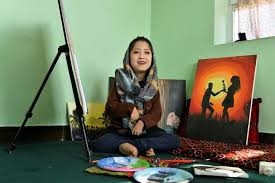 Afghan artist brushes aside disability to open arts centre
