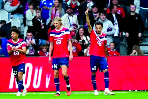 Late Mbappe goal sends Lille top of Ligue 1