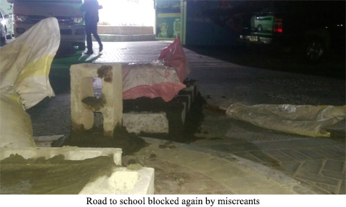 Road to school blocked again by miscreants