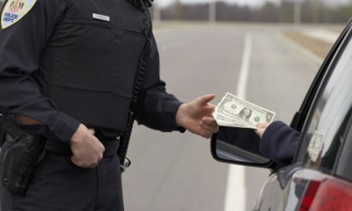 Prisoner bribes Bahrain cop with cash and car