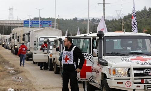 Aid trucks enter starvation-hit Syria town Aid trucks enter starvation-hit Syria town