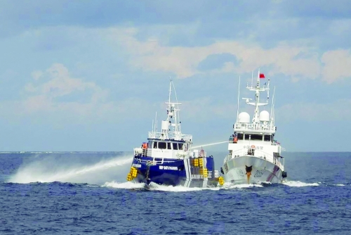 China, Philippines trade blame over boat collision in disputed sea