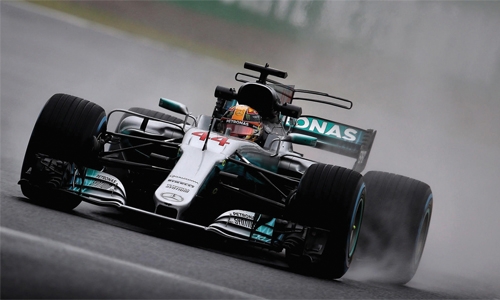 Hamilton fastest amid Suzuka deluge Hamilton fastest amid Suzuka deluge