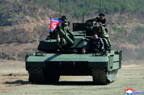 North Korean leader, daughter try out new tank North Korean leader, daughter try out new tank