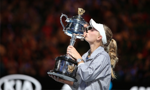 Wozniacki clinches first Grand Slam