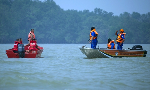 Malaysia migrant boat death toll rises to 12, some 25 missing Malaysia migrant boat death toll rises to 12, some 25 missing
