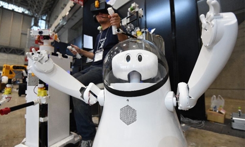 Robots galore as Asia's biggest tech fair kicks off Robots galore as Asia's biggest tech fair kicks off