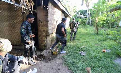 Philippine forces hunt top Islamist militant in city Philippine forces hunt top Islamist militant in city