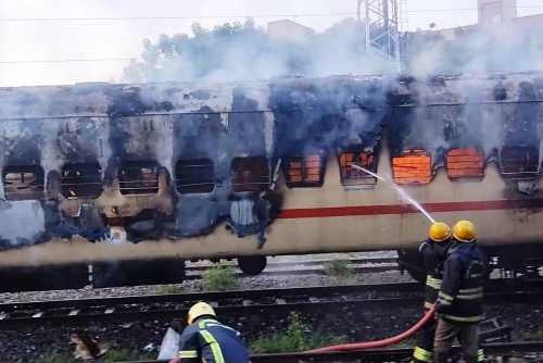 Nine killed in Indian train coach fire Nine killed in Indian train coach fire