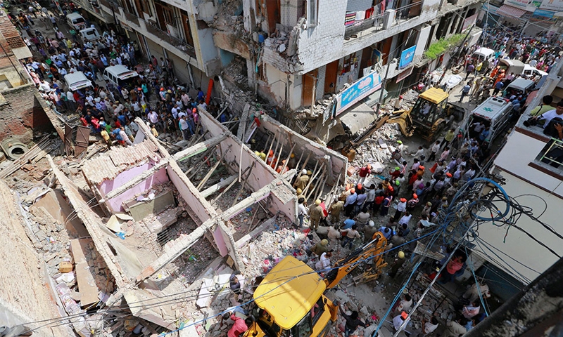 Building collapse kills five Building collapse kills five