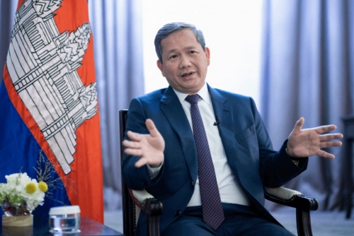 Cambodian PM's cousin says owned 30% of scam-linked firm Cambodian PM's cousin says owned 30% of scam-linked firm