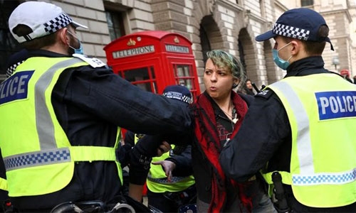 UK police arrest 155 in anti-lockdown protests in London