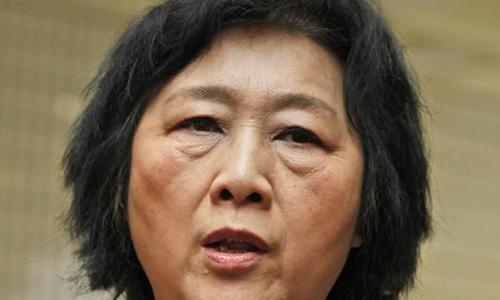 China upholds conviction of journalist, 71, grants parole: lawyer