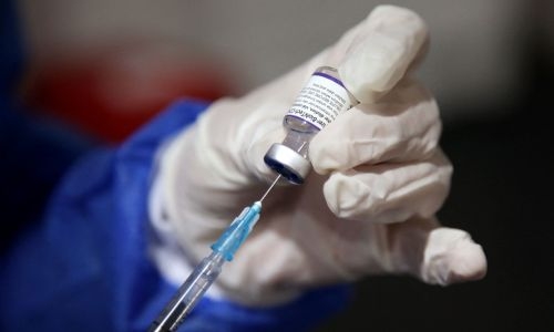 Pfizer reports loss as Covid-19 revenues shrink Pfizer reports loss as Covid-19 revenues shrink