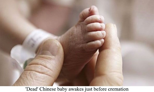 'Dead' Chinese baby awakes just before cremation