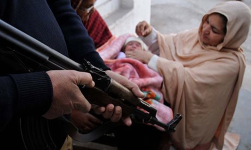 Gunmen kill seven police guarding polio team in Pakistan Gunmen kill seven police guarding polio team in Pakistan