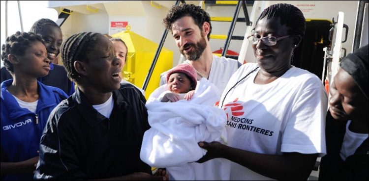 Baby ‘Miracle’ born on rescue ship as Italy arrivals surge 