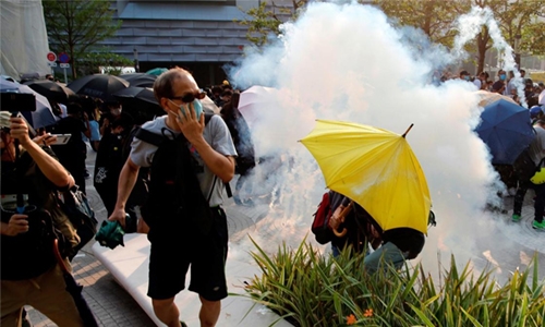 Hong Kong police fire tear gas, water cannon Hong Kong police fire tear gas, water cannon