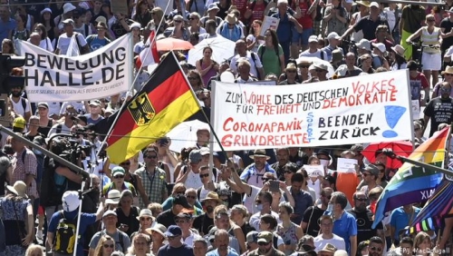 Thousands march in Berlin against coronavirus curbs