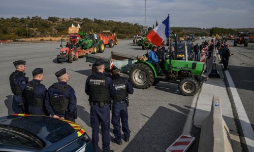 French farmers lift roadblocks as Europe protests persist