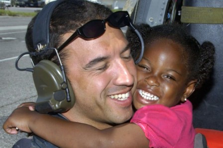 Rescuer to meet kid from Hurricane Katrina hug photo